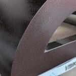 rivestimento color rame bucciato forno a legna VIBROK