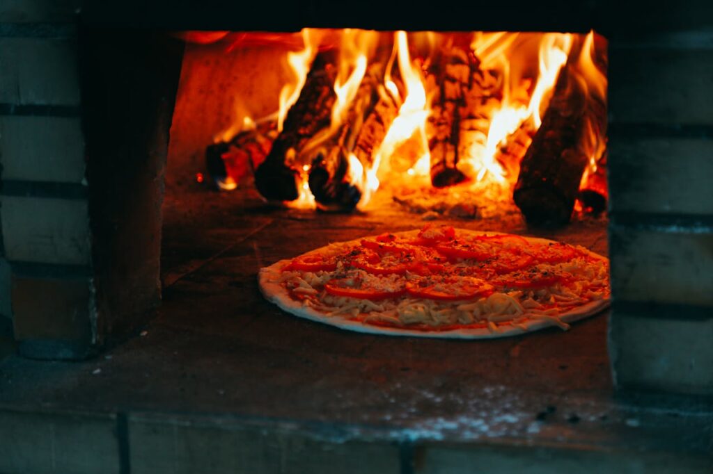 fuoco nel forno a legna